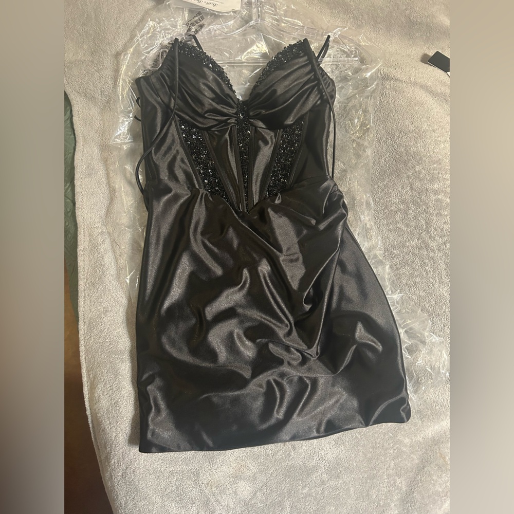 Black beaded corset dress
Worn once 
Perfect for homecoming
Brand is Nox Anabel